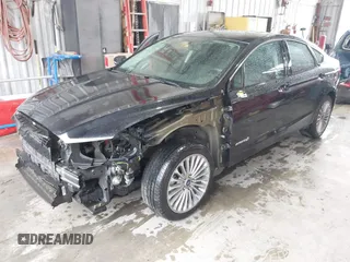 2013 Ford Fusion Titanium Hybrid with VIN 3FA6P0RU4DR281789, listed as a IAAI auction lot 41909115 with 161,008 mi miles and . Bid and sale history available at DreamBid. Image 18.