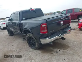 2020 Ram 1500 Limited with VIN 1C6SRFHT5LN422246, listed as a IAAI auction lot 41948083 with 82,032 mi miles and . Bid and sale history available at DreamBid. Image 3.