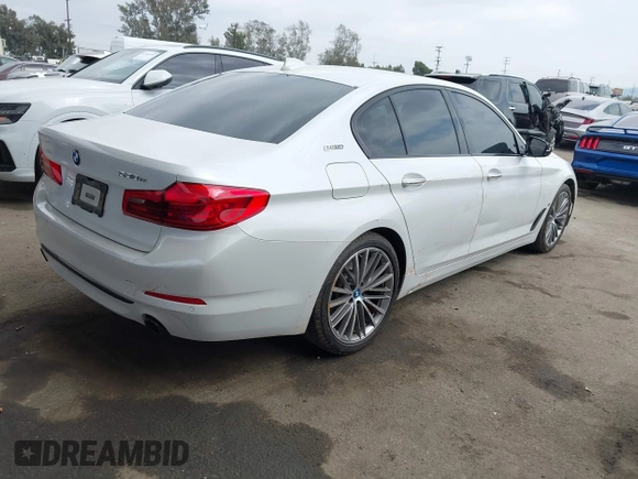 2018 BMW 5 Series 530e with VIN WBAJA9C5XJB033667, listed as a IAAI auction lot 42107936 with 55,753 mi miles and . Bid and sale history available at DreamBid. Image 4.