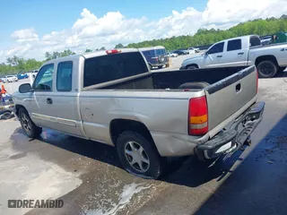 2004 Chevrolet Silverado 1500 Work Truck with VIN 2GCEC19V641117092, listed as a IAAI auction lot 42015604 with 1 mi miles. Bid and sale history available at carsss.com. Image 3.