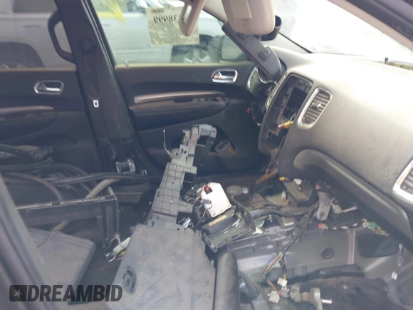 2015 Dodge Durango SXT with VIN 1C4RDHAG4FC113821, listed as a IAAI auction lot 42338999 with Not provided miles and . Bid and sale history available at DreamBid. Image 5.