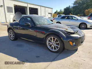 2010 Mazda MX-5 Miata Grand Touring with VIN JM1NC2FFXA0206089, listed as a Copart auction lot 76752674 with 212,584 mi miles and Salvage title. Bid and sale history available at DreamBid. Image 4.
