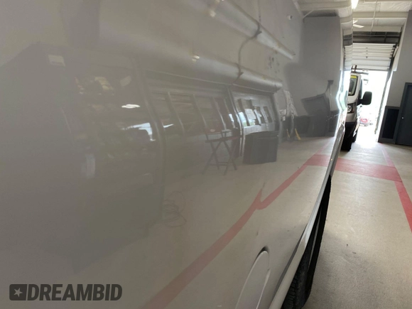2017 Chevrolet Express Cargo with VIN 1GCWGAFF7H1324799, listed as a IAAI auction lot 42886617 with 214,293 mi miles and . Bid and sale history available at DreamBid. Image 13.