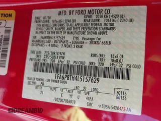 2020 Ford Mustang EcoBoost with VIN 1FA6P8TH4L5157629, listed as a IAAI auction lot 42650450 with 34,152 mi miles and . Bid and sale history available at DreamBid. Image 9.