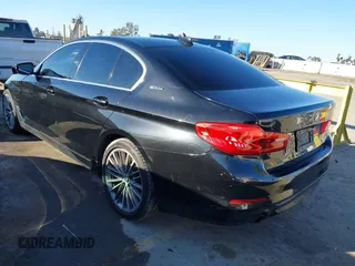 2019 BMW 5 Series 530e with VIN WBAJA9C57KB399541, listed as a IAAI auction lot 41656775 with 96,523 mi miles and . Bid and sale history available at DreamBid. Image 3.