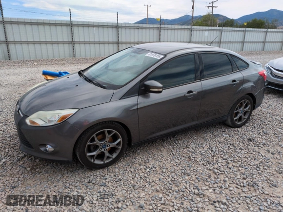 2013 Ford Focus SE with VIN 1FADP3F24DL189897, listed as a Copart auction lot 61970155 with 212,218 mi miles and Salvage title. Bid and sale history available at DreamBid. Image 1.