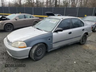 1996 Honda Civic LX "O" w/Air with VIN 2HGEJ6678TH532897, listed as a Copart auction lot 85542984 with 325,764 mi miles and Salvage Title. Bid and sale history available at carsss.com. Image 1.