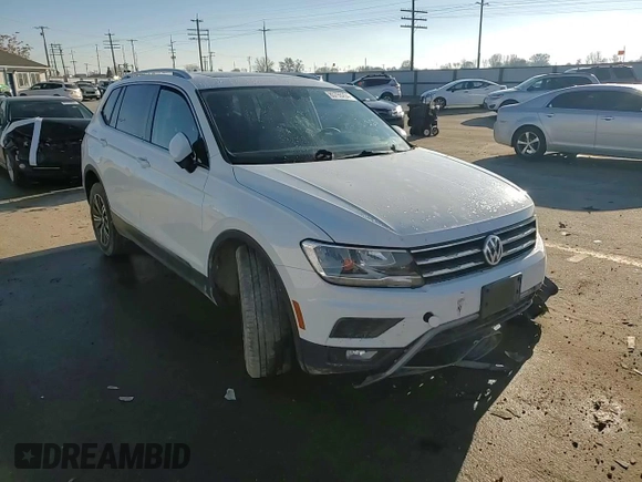2018 Volkswagen Tiguan SEL z VIN 3VV2B7AX0JM017033, wystawiony jako Copart lot #85799204 z przebiegiem 64 075 mil mil oraz Szkoda całkowita • Salvage title. Historia ofert i sprzedaży dostępna na DreamBid. Obrazek 11.