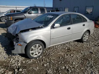 2005 Suzuki Forenza S z VIN KL5JD56Z95K119565, wystawiony jako Copart lot #43051135 z przebiegiem 143 172 mil mil oraz Nie do naprawy • Non repairable. Historia ofert i sprzedaży dostępna na DreamBid. Obrazek 1.
