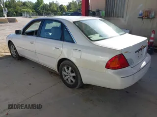 2001 Toyota Avalon XL z VIN 4T1BF28B01U142721, wystawiony jako IAAI lot #42340748 z przebiegiem 204 644 mil mil oraz . Historia ofert i sprzedaży dostępna na DreamBid. Obrazek 3.