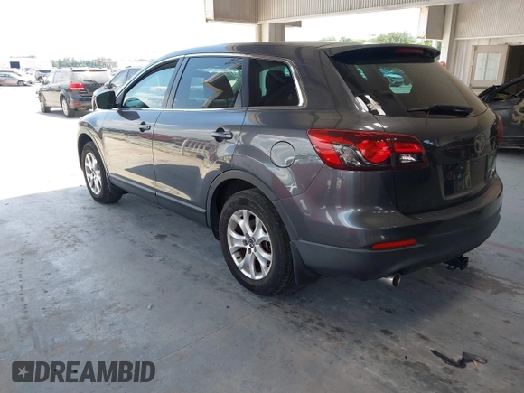 2013 Mazda CX-9 Sport with VIN JM3TB2BAXD0407958, listed as a IAAI auction lot 42346949 with 132,855 mi miles and . Bid and sale history available at DreamBid. Image 3.
