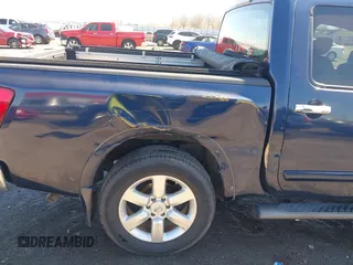 2011 Nissan Titan SV with VIN 1N6BA0ED7BN311347, listed as a IAAI auction lot 41634291 with 116,424 mi miles and . Bid and sale history available at DreamBid. Image 6.