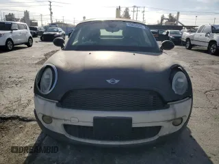 2013 MINI Coupe S z VIN WMWSX3C55DT772606, wystawiony jako Copart lot #43653845 z przebiegiem 39 474 mil mil oraz Czysty tytuł • Clean title. Historia ofert i sprzedaży dostępna na DreamBid. Obrazek 5.