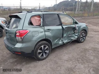 2017 Subaru Forester Limited with VIN JF2SJALC3HH417998, listed as a IAAI auction lot 41988638 with 140,000 mi miles. Bid and sale history available at carsss.com. Image 4.