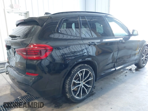 2020 BMW X3 M40i with VIN 5UXTY9C00L9B70494, listed as a IAAI auction lot 41596431 with 57,127 mi miles and . Bid and sale history available at DreamBid. Image 4.