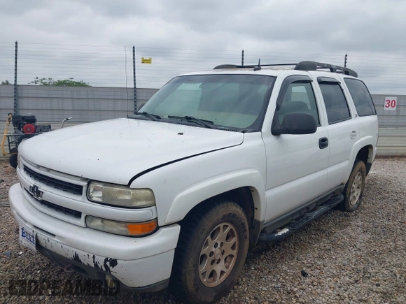 2003 Chevrolet Tahoe LS with VIN 1GNEK13Z63R135474, listed as a IAAI auction lot 42127546 with 318,623 mi miles and . Bid and sale history available at DreamBid. Image 2.