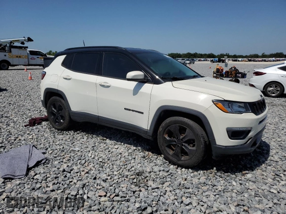 2018 Jeep Compass Altitude with VIN 3C4NJCBB1JT407980, listed as a Copart auction lot 56122885 with 133,615 mi miles and Clean title. Bid and sale history available at DreamBid. Image 4.