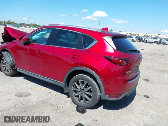 2018 Mazda CX-5 Grand Touring with VIN JM3KFADM0J0377091, listed as a IAAI auction lot 41677544 with 91,758 mi miles. Bid and sale history available at carsss.com. Image 3.