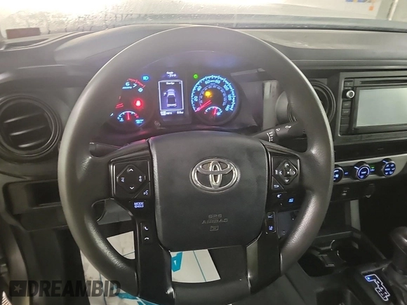 2018 Toyota Tacoma SR with VIN 5TFSX5EN6JX062775, listed as a IAAI auction lot 42774090 with 146,583 mi miles and . Bid and sale history available at DreamBid. Image 14.