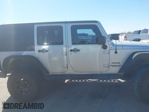 2012 Jeep Wrangler Unlimited Sport with VIN 1C4BJWDG8CL270788, listed as a IAAI auction lot 41758929 with 138,935 mi miles. Bid and sale history available at carsss.com. Image 13.