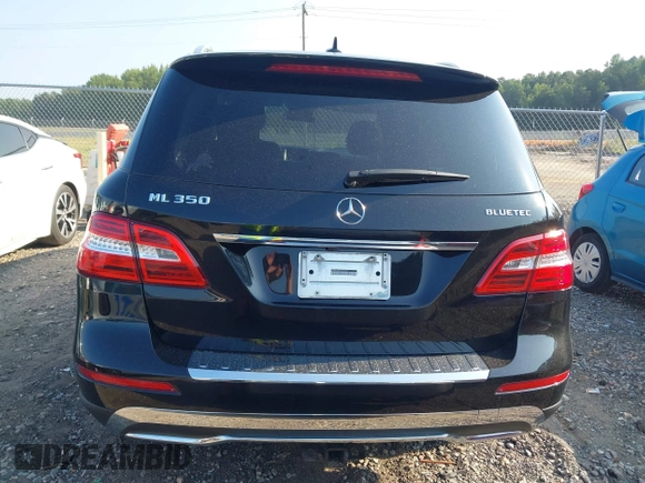 2014 Mercedes-Benz M 350 with VIN 4JGDA2EB8EA432840, listed as a IAAI auction lot 42606950 with 184,364 mi miles and . Bid and sale history available at DreamBid. Image 16.