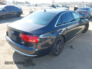 2011 Audi A8 with VIN WAURVAFD9BN014362, listed as a IAAI auction lot 41960366 with 135,244 mi miles and . Bid and sale history available at DreamBid. Image 4.