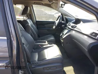 2015 Honda Odyssey EX-L with VIN 5FNRL5H67FB130663, listed as a IAAI auction lot 41988034 with 180,254 mi miles and . Bid and sale history available at carsss.com. Image 5.