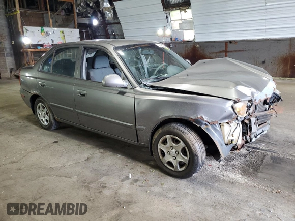 2005 Hyundai Accent GLS with VIN KMHCG45C95U632932, listed as a Copart auction lot 69448004 with 0 mi miles and Salvage Title. Bid and sale history available at carsss.com. Image 4.