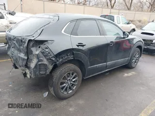 2020 Mazda CX-30 with VIN 3MVDMABLXLM113036, listed as a IAAI auction lot 41173272 with 65,570 mi miles. Bid and sale history available at carsss.com. Image 4.
