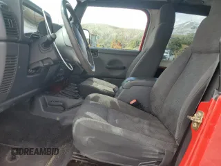 2003 Jeep Wrangler Sport with VIN 1J4FA49S83P369892, listed as a Copart auction lot 56536745 with 182,535 mi miles and Salvage title. Bid and sale history available at DreamBid. Image 7.