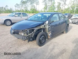 2015 Toyota Corolla L with VIN 5YFBURHE0FP283354, listed as a IAAI auction lot 41530183 with 165,228 mi miles and . Bid and sale history available at DreamBid. Image 2.