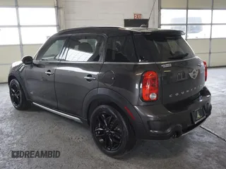 2016 MINI Countryman S with VIN WMWZC5C55GWU00997, listed as a Copart auction lot 58840965 with 41,217 mi miles and Salvage title. Bid and sale history available at DreamBid. Image 4.