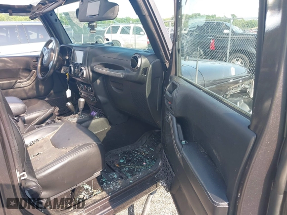 2016 Jeep Wrangler Unlimited Sport with VIN 1C4BJWDG9GL211030, listed as a IAAI auction lot 42459945 with 61,671 mi miles and . Bid and sale history available at DreamBid. Image 5.