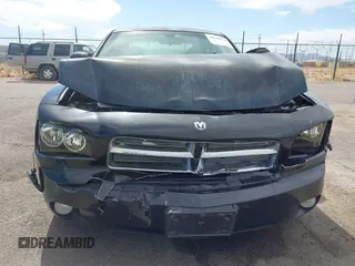 2010 Dodge Charger SXT with VIN 2B3CA3CV4AH153286, listed as a IAAI auction lot 42110970 with 162,424 mi miles and . Bid and sale history available at DreamBid. Image 12.