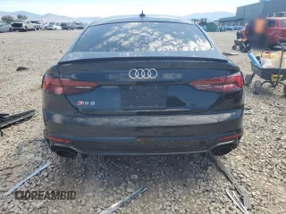 2019 Audi RS 5 Sportback z VIN WUABWCF55KA901621, wystawiony jako Copart lot #67157414 z przebiegiem 99 954 mil mil oraz Szkody całkowita. Historia ofert i sprzedaży dostępna na DreamBid. Obrazek 6.