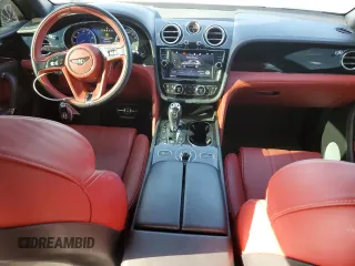 2019 Bentley Bentayga V8 z VIN SJAAM2ZV5KC024154, wystawiony jako Copart lot #74990344 z przebiegiem 41 589 mil mil oraz Szkoda całkowita • Salvage title. Historia ofert i sprzedaży dostępna na DreamBid. Obrazek 8.