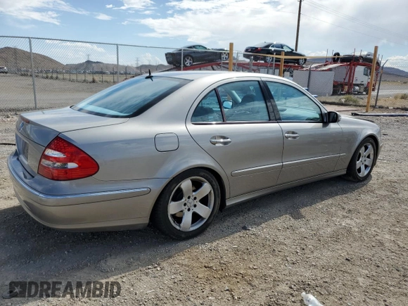 2004 Mercedes-Benz E-Class 5.0L with VIN WDBUF70J54A496963, listed as a Copart auction lot 64214634 with 113,575 mi miles and Salvage Title. Bid and sale history available at carsss.com. Image 3.