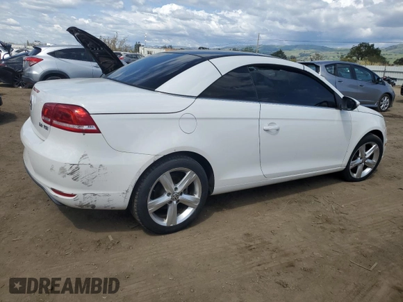 2012 Volkswagen Eos Lux with VIN WVWFW7AH8CV018727, listed as a Copart auction lot 51332135 with 104,636 mi miles and Salvage Title. Bid and sale history available at DreamBid. Image 3.