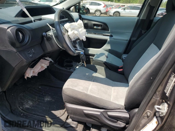 2012 Toyota Prius One z VIN JTDKDTB39C1028254, wystawiony jako Copart lot #59550425 z przebiegiem Nie podano mil oraz Nie do naprawy • Non repairable. Historia ofert i sprzedaży dostępna na DreamBid. Obrazek 7.
