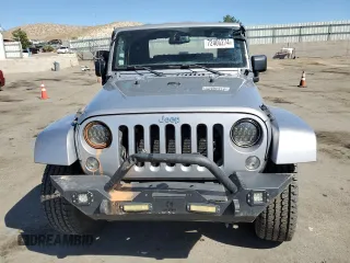 2015 Jeep Wrangler Sahara с VIN 1C4AJWBG1FL742588, выставлен на аукционе Copart как лот 72400274 с пробегом 139 520 миль миль и Списание • Salvage title. История ставок и продаж доступна на DreamBid. Изображение 5.