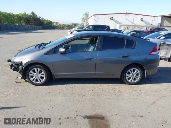 2012 Honda Insight EX z VIN JHMZE2H77CS001370, wystawiony jako IAAI lot #42312077 z przebiegiem 134 249 mil mil oraz . Historia ofert i sprzedaży dostępna na DreamBid. Obrazek 15.