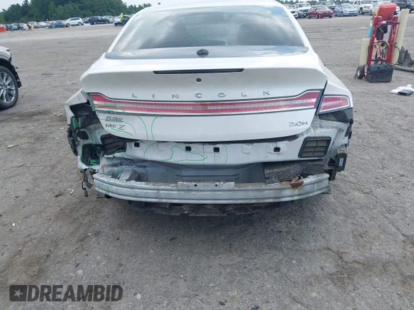 2014 Lincoln MKZ Hybrid z VIN 3LN6L2LU2ER825732, wystawiony jako IAAI lot #42606357 z przebiegiem 153 966 mil mil oraz . Historia ofert i sprzedaży dostępna na DreamBid. Obrazek 15.