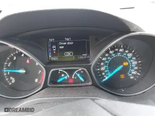 2013 Ford Escape SE with VIN 1FMCU9G92DUB07099, listed as a IAAI auction lot 41730458 with 136,633 mi miles. Bid and sale history available at carsss.com. Image 7.