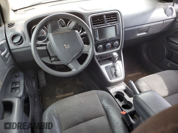 2010 Dodge Caliber Mainstreet z VIN 1B3CB3HA1AD568937, wystawiony jako Copart lot #55159255 z przebiegiem 128 014 mil mil oraz Szkody całkowita. Historia ofert i sprzedaży dostępna na DreamBid. Obrazek 8.