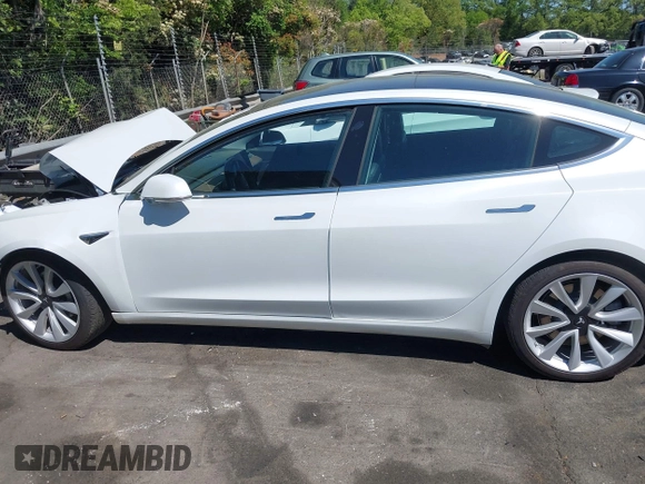 2020 Tesla Model 3 Performance z VIN 5YJ3E1EC2LF587069, wystawiony jako IAAI lot #42063691 z przebiegiem Nie podano mil oraz . Historia ofert i sprzedaży dostępna na DreamBid. Obrazek 13.