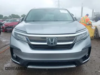 2019 Honda Pilot Touring 8-Passenger with VIN 5FNYF6H98KB097105, listed as a IAAI auction lot 42353009 with 133,212 mi miles and . Bid and sale history available at DreamBid. Image 12.