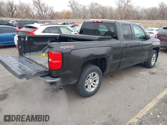 2014 Chevrolet Silverado 1500 LT with VIN 1GCVKREC8EZ325070, listed as a IAAI auction lot 41328199 with 164,009 mi miles and . Bid and sale history available at DreamBid. Image 4.