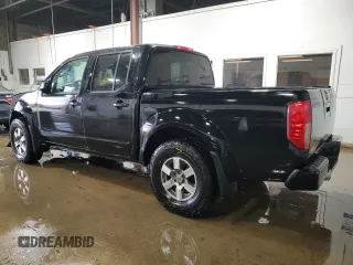 2010 Nissan Frontier LE with VIN 1N6AD0EV6AC412658, listed as a Copart auction lot 42023495 with 95,141 mi miles and Salvage title. Bid and sale history available at DreamBid. Image 2.
