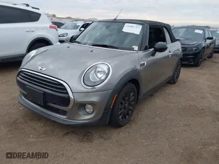 2016 MINI Cooper Convertible with VIN WMWWG5C51G3A81075, listed as a IAAI auction lot 41681717 with 54,956 mi miles. Bid and sale history available at carsss.com. Image 17.