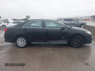 2014 Toyota Camry L with VIN 4T1BF1FK0EU823710, listed as a IAAI auction lot 42153523 with 105,468 mi miles and . Bid and sale history available at DreamBid. Image 13.